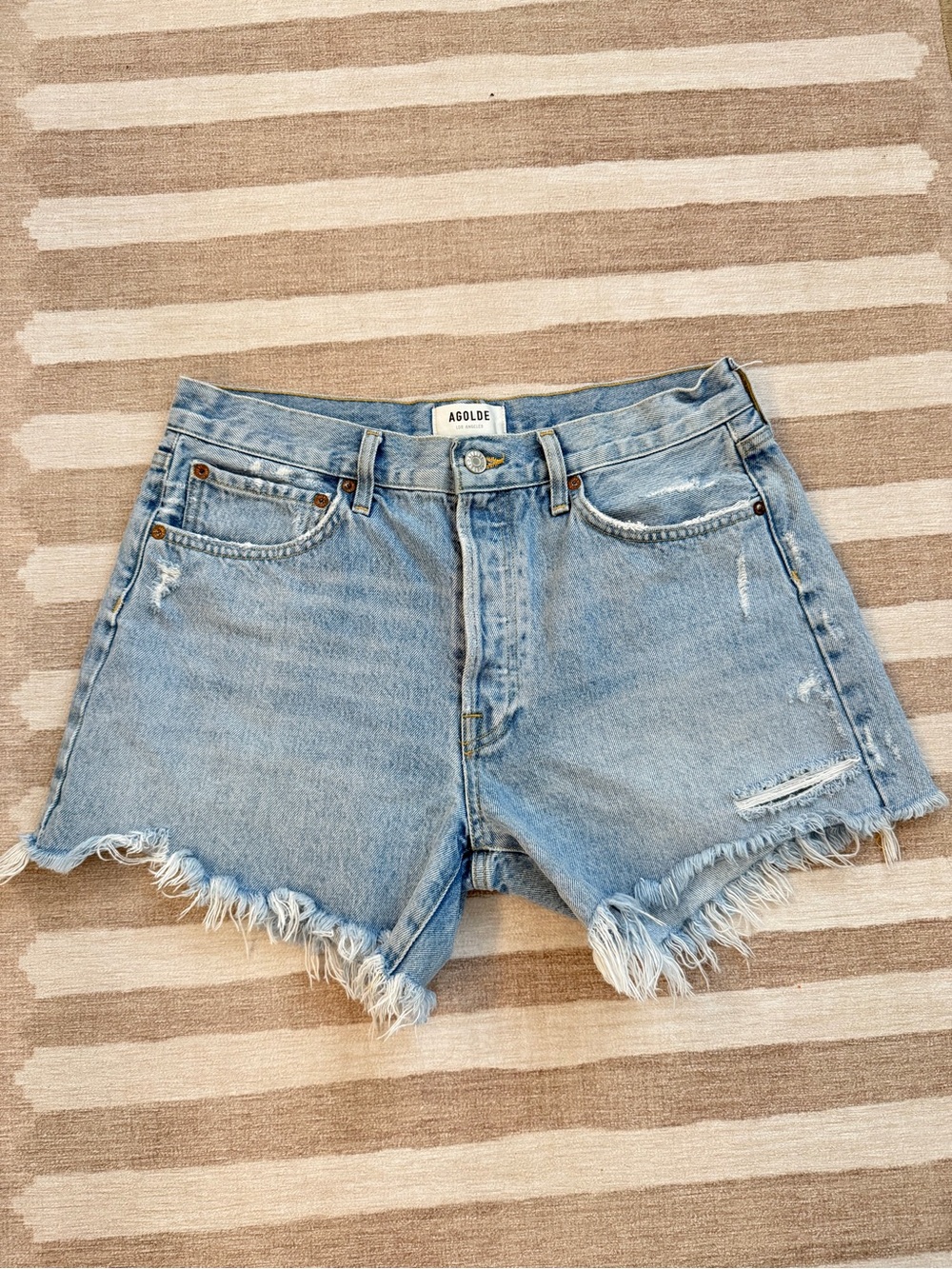 AGOLDE Medium Wash Frayed Hem Denim Cutoff Shorts